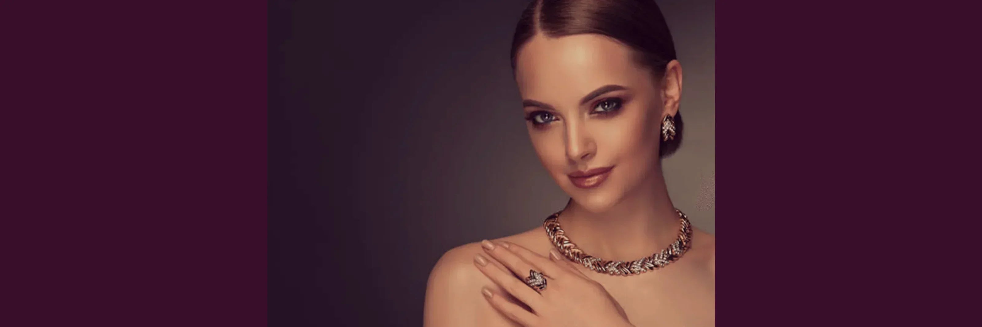 Woman wearing elegant gold-plated necklace, earrings, and ring jewelry set