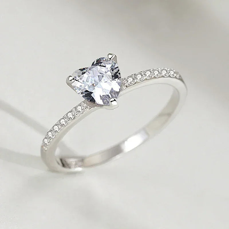 Heart-shaped solitaire ring with pave band, 925 silver, elegant women's jewelry