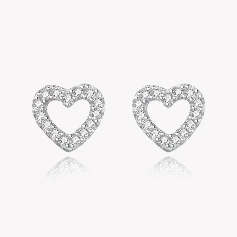 925 silver heart-shaped stud earrings with sparkling crystal accents on white background