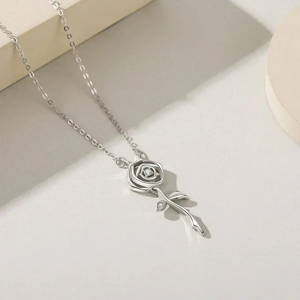 Silver necklace with a rose-shaped pendant on a light background-Eternal Rose Pendant Necklace - TM & Co. Jewels