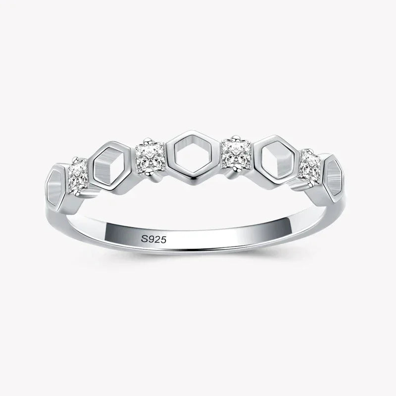 925 silver geometric ring with hexagon shapes and cubic zirconia accents on white background