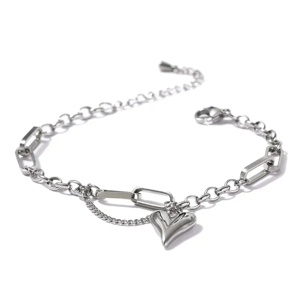 Sterling silver chain bracelet with heart charm and modern rectangular links
