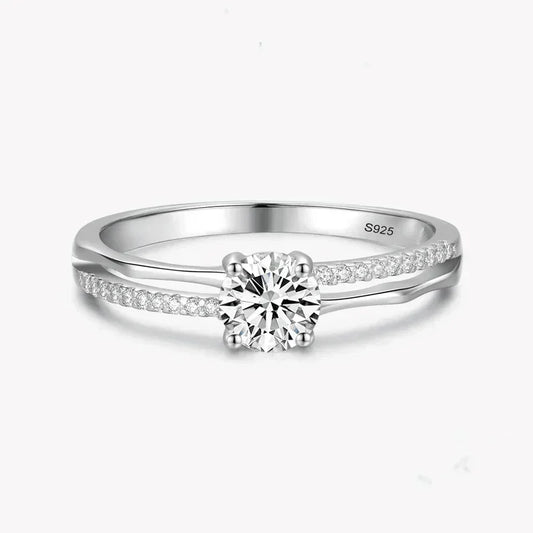 925 silver ring with round solitaire center and pavé set stones on split band