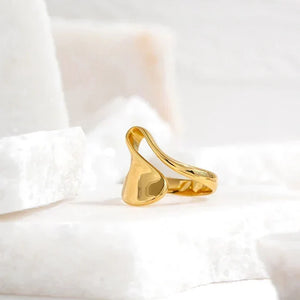 18K gold-plated abstract statement ring with modern sculptural design on white background