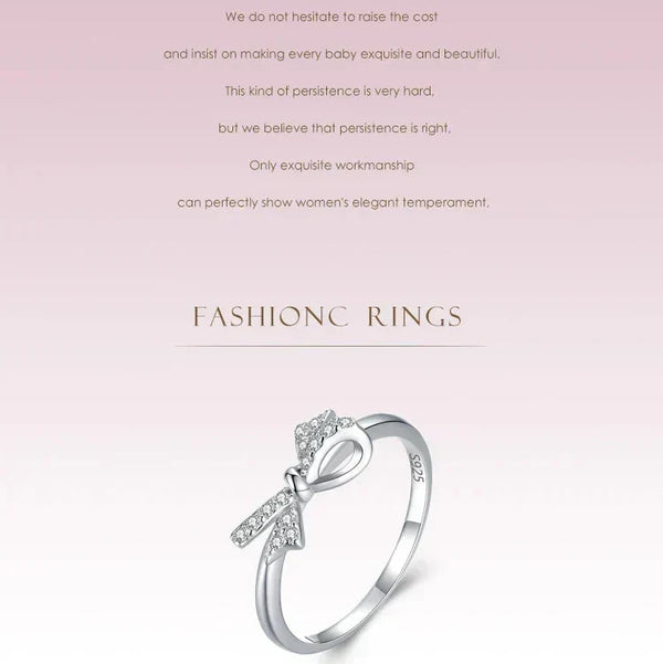 Sterling silver ring with a bow design and sparkling cubic zirconia accents- TM & CO. JEWELS 