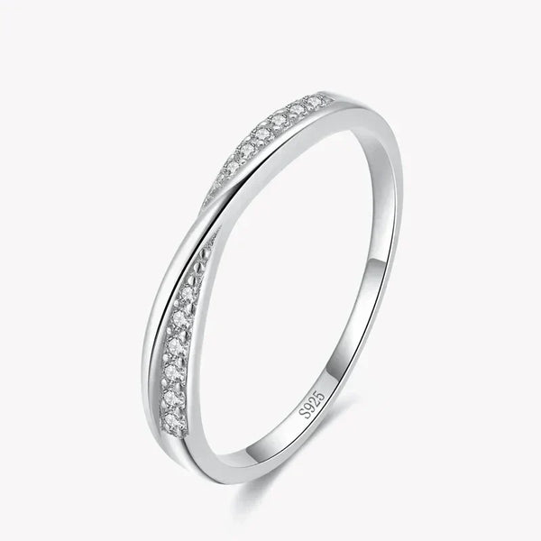 Sterling silver ring with double row of small clear gemstones on white background