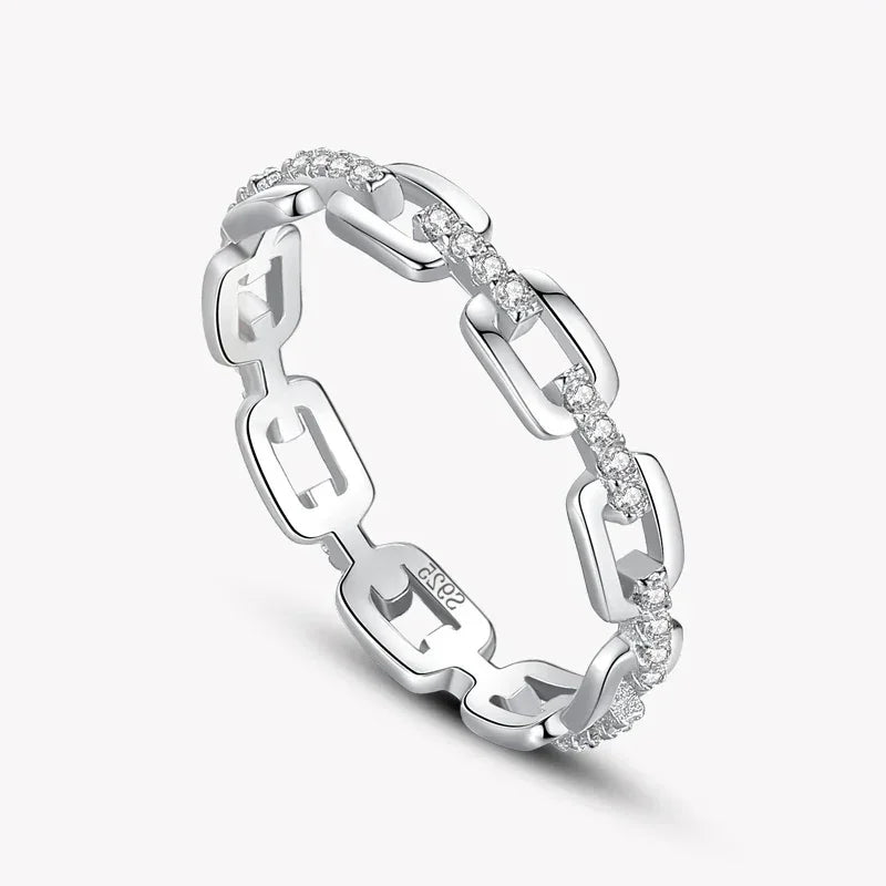 925 silver chain link ring with sparkling crystals on a white background