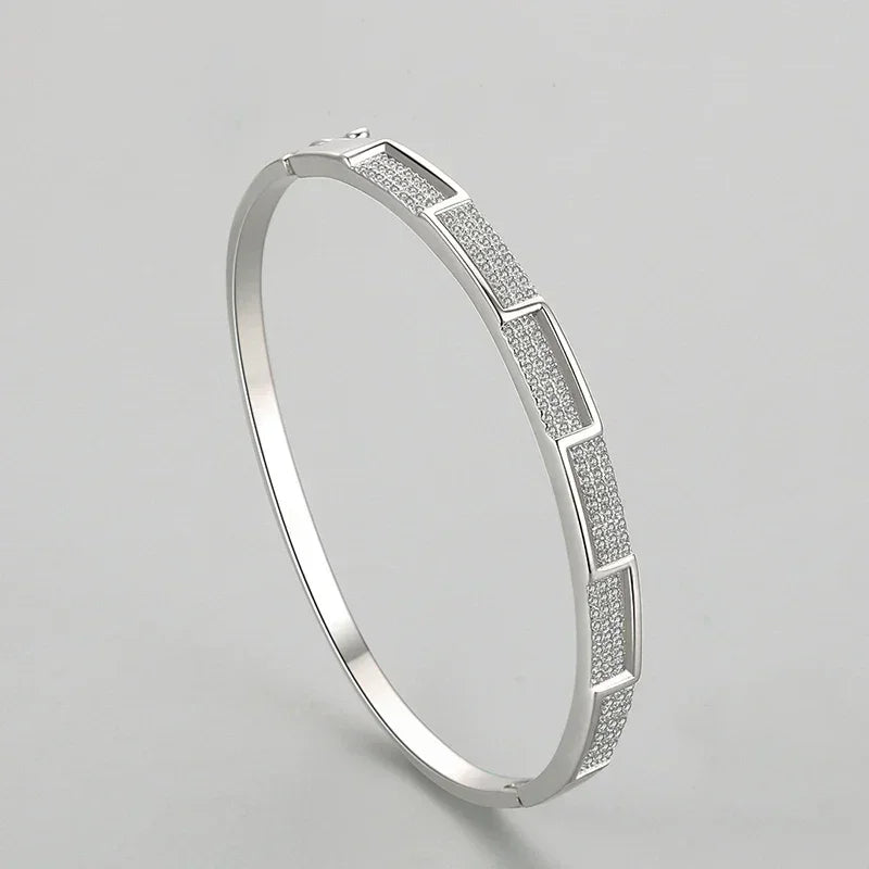 925 sterling silver bangle bracelet with geometric pavé crystal detailing, elegant women's jewelry