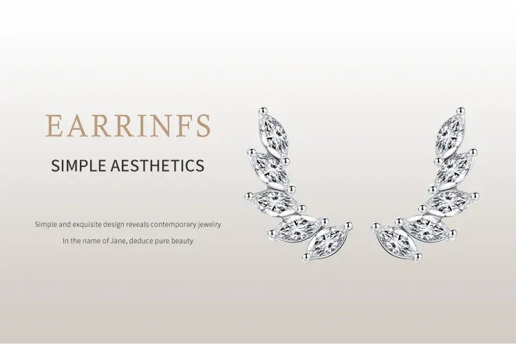 Elegant marquise-cut crystal silver stud earrings on a neutral background, modern jewelry