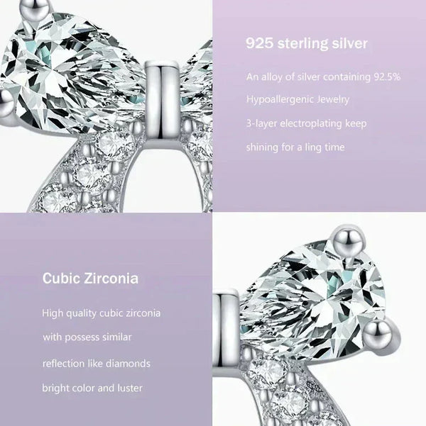 Earring with cubic zirconia stones on a purple background with product details text.