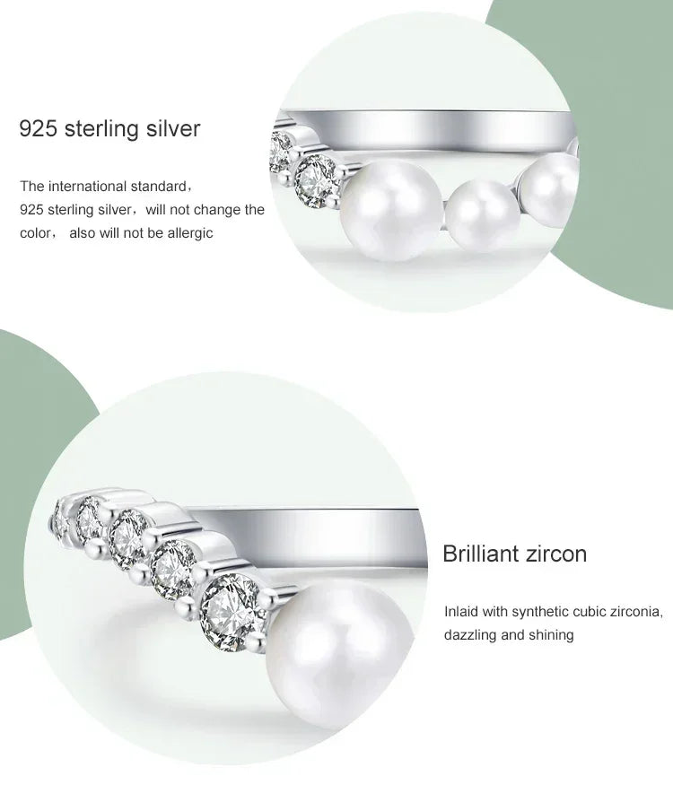 925 sterling silver ring with pearls and sparkling cubic zirconia accents on white background