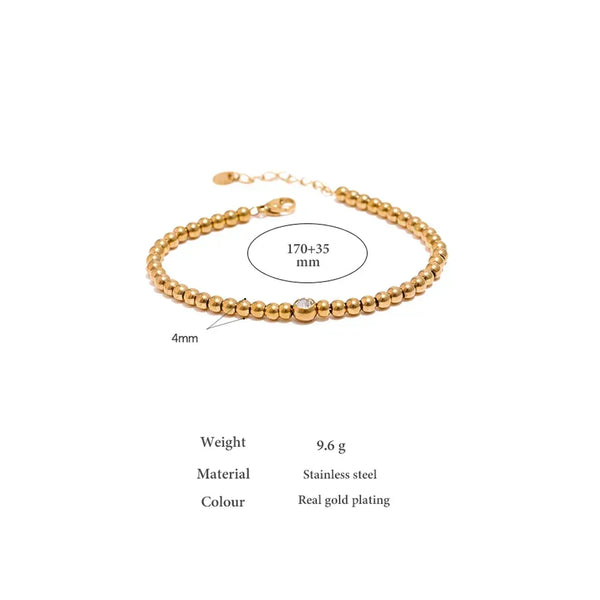 Gold-plated stainless steel beaded bracelet with round gem accent, 4mm beads, adjustable length.