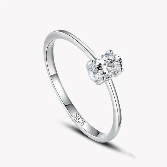 925 sterling silver solitaire ring with round clear gemstone on white background