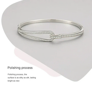 Silver bracelet with intricate design on a light gray background-Crystal Maze Sterling Bracelet - TM & CO. JEWELS 