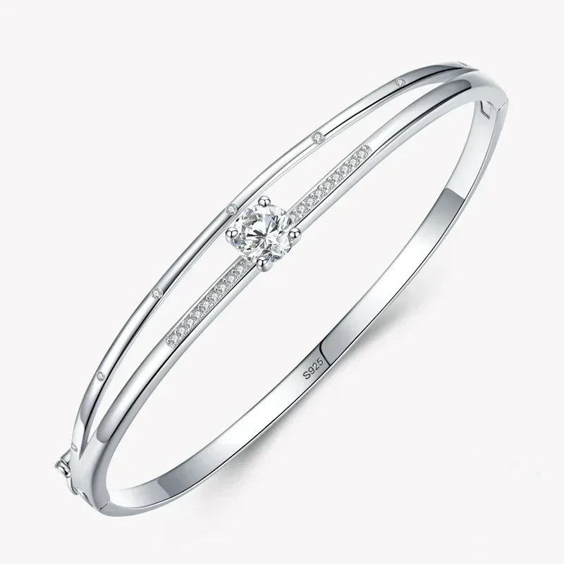 Elegant 925 silver bangle with center round crystal and inset pavé stones, minimalist design