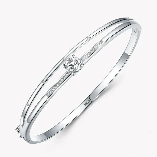 Elegant 925 silver bangle with center round crystal and inset pavé stones, minimalist design