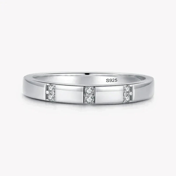 Sterling silver 925 ring with three sets of small clear gemstones, minimalist design