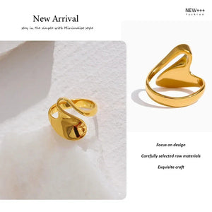 18K gold-plated abstract statement ring with modern sculptural design on white background