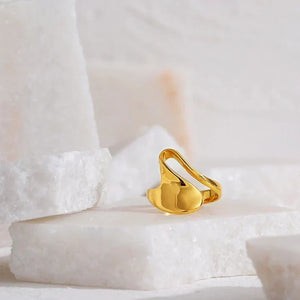 18K gold-plated abstract statement ring with modern sculptural design on white background