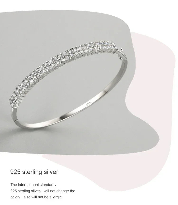 925 sterling silver bracelet with sparkling cubic zirconia stones on neutral background