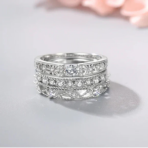 Sterling silver ring with intricate filigree and sparkling cubic zirconia stones