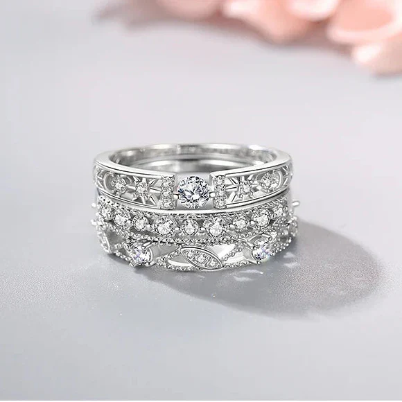 Sterling silver ring with intricate filigree and sparkling cubic zirconia stones
