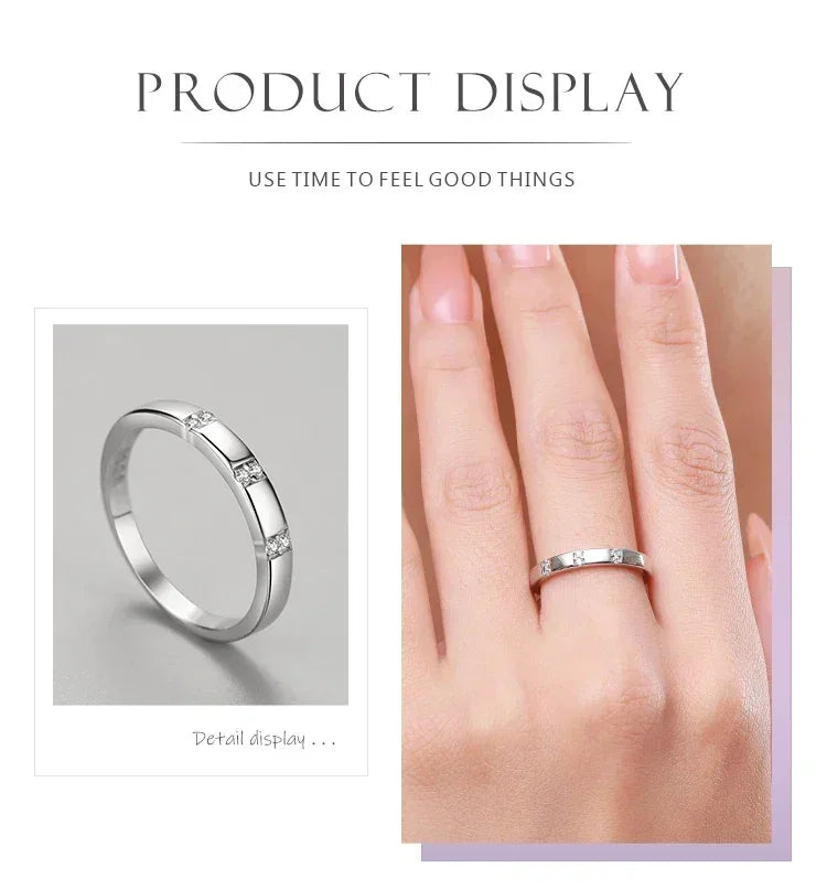 Sterling silver ring with three small gemstones, shown on a hand and in close-up.