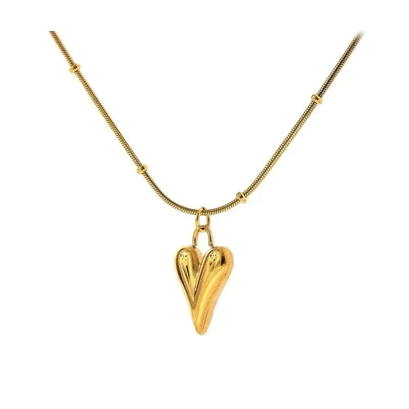 18K gold-plated heart pendant necklace with a sleek gold chain on white background