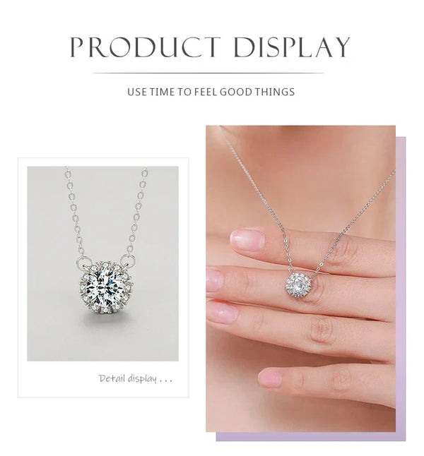 Silver necklace with a diamond pendant on a light gray background.