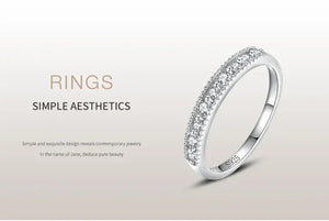925 silver ring with sparkling pavé crystals on a neutral background, minimalist jewelry design