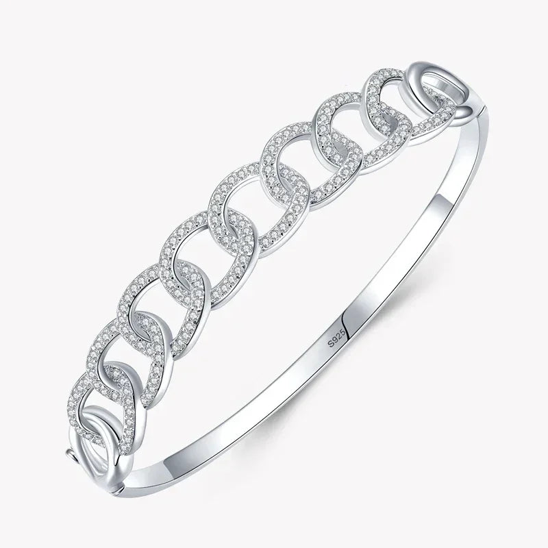 925 silver chain link bangle bracelet with pavé cubic zirconia accents on white background