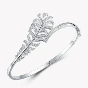 Silver feather Clear Silver Feather Band - TM & CO. JEWELS -shaped bracelet on a white background.