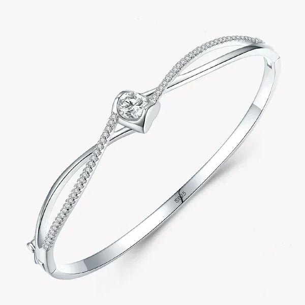 Elegant 925 silver bangle with heart-shaped centerpiece and sparkling cubic zirconia accents