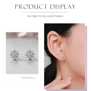 Silver earrings with gemstones displayed on a model's ear, with text 'Product Display' and 'Use time to feel good things'.
