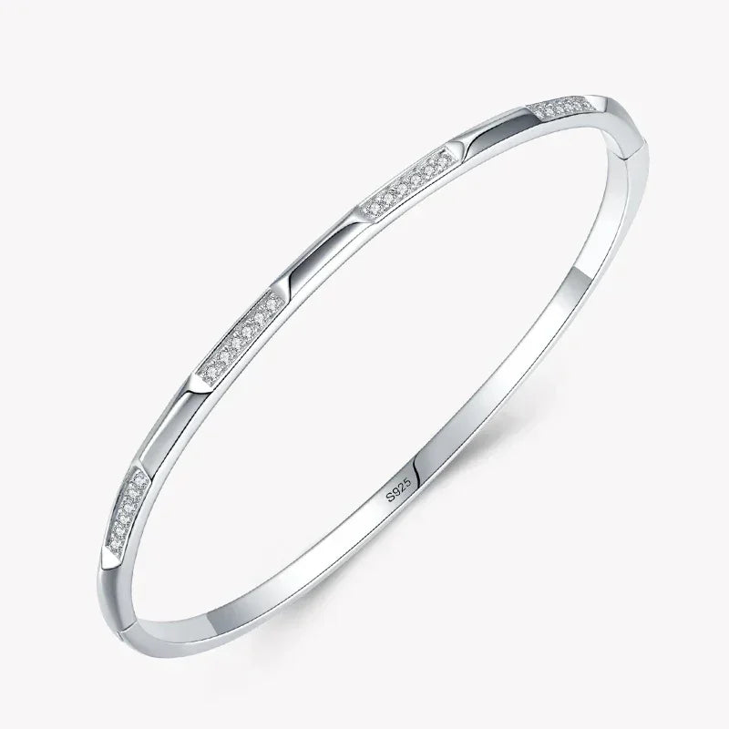 925 silver bangle bracelet with cubic zirconia accents on a white background