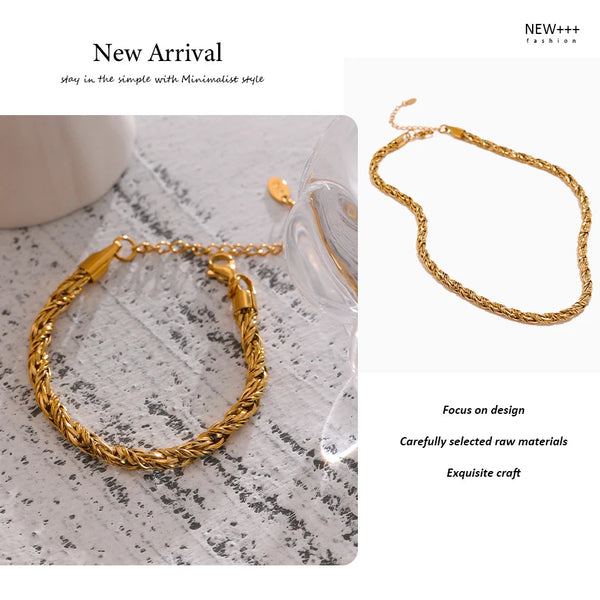 Gold bracelet on a textured surface with 'NEW++' branding.