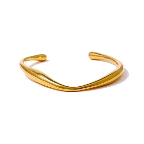 Gold bracelet on a white background