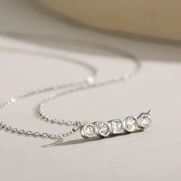Silver necklace with diamond pendants on a light background-Geometric Fusion Pendant - TM & Co. Jewels