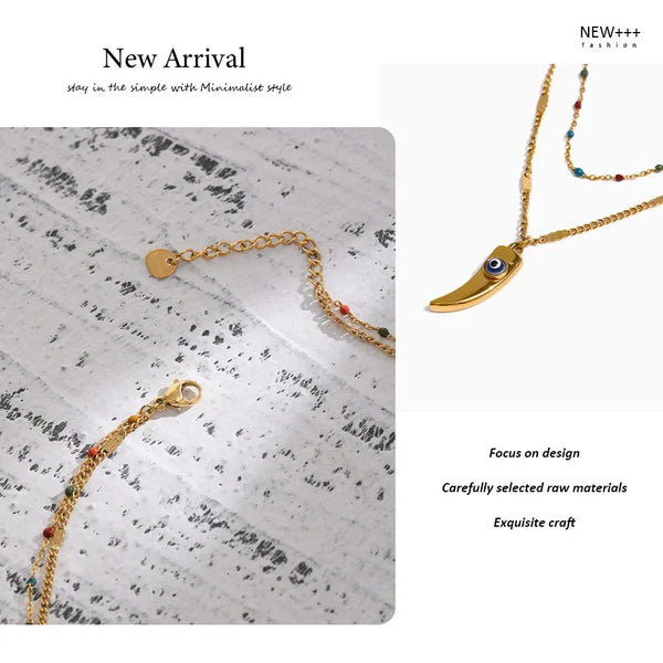Gold necklaces on a textured surface with 'NEW++' branding.