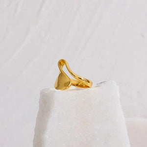 18K gold-plated abstract statement ring with modern sculptural design on white background