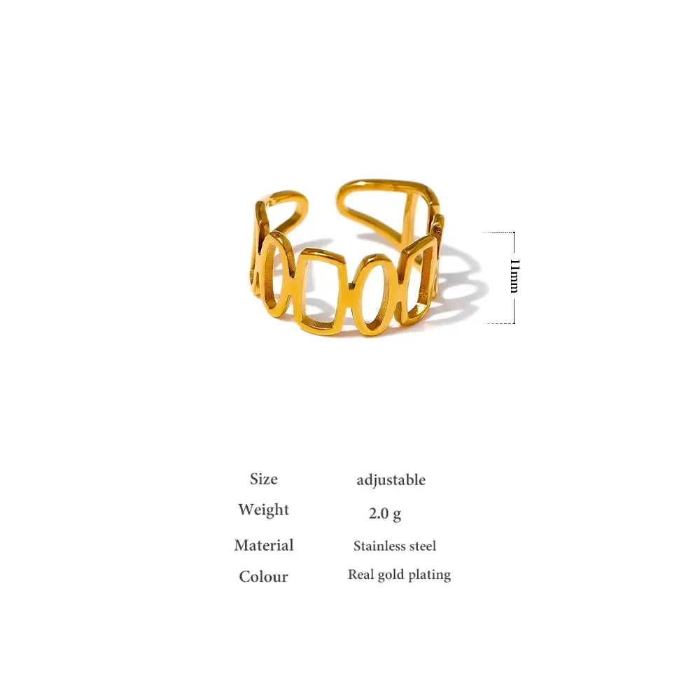 Adjustable gold-plated stainless steel ring with geometric cut-out design, 11mm width.