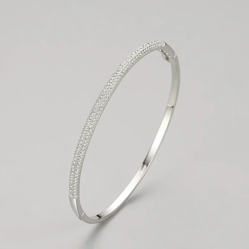 925 silver bangle bracelet with pavé cubic zirconia, minimalist women's jewelry on gray