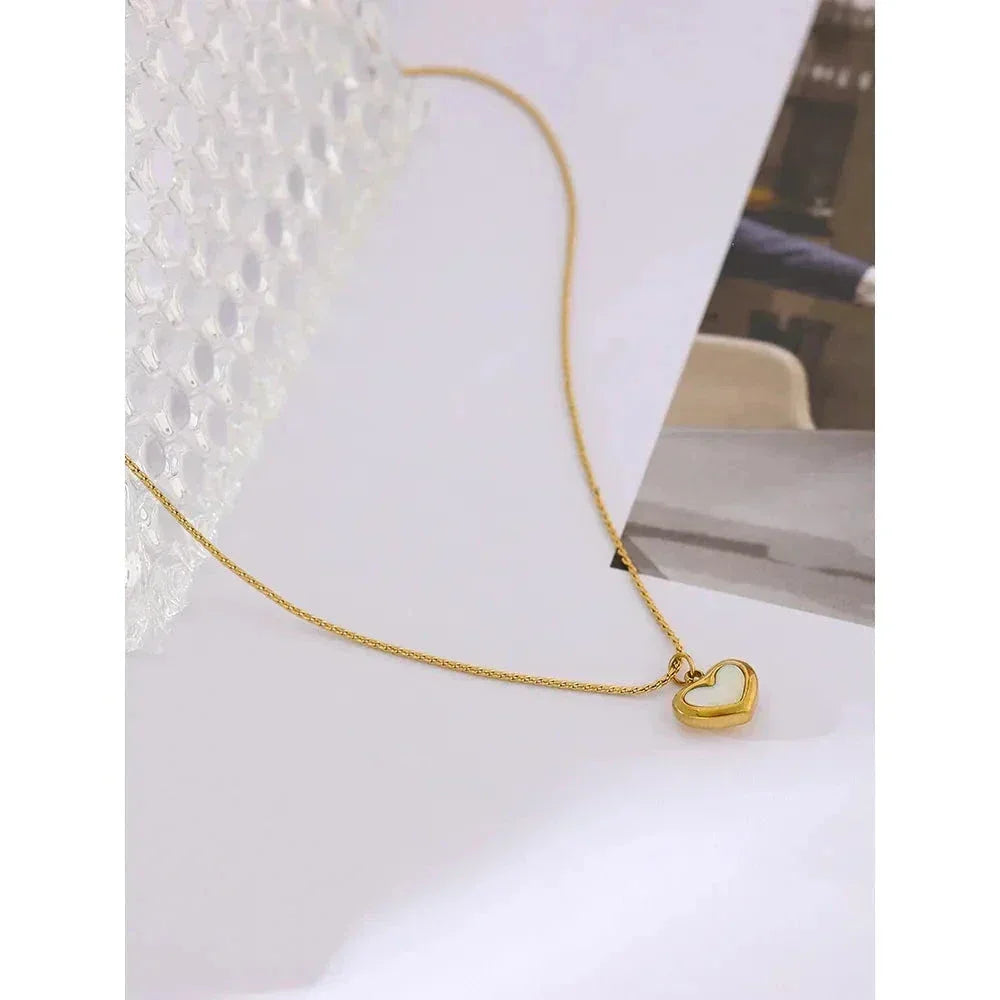 18K gold-plated necklace with a heart-shaped pendant on a white background