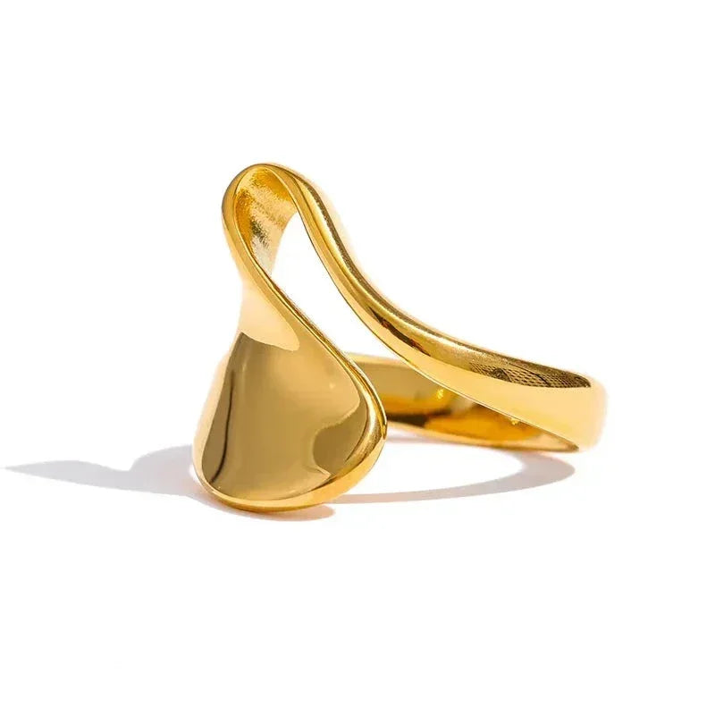 18K gold-plated abstract statement ring with modern sculptural design on white background