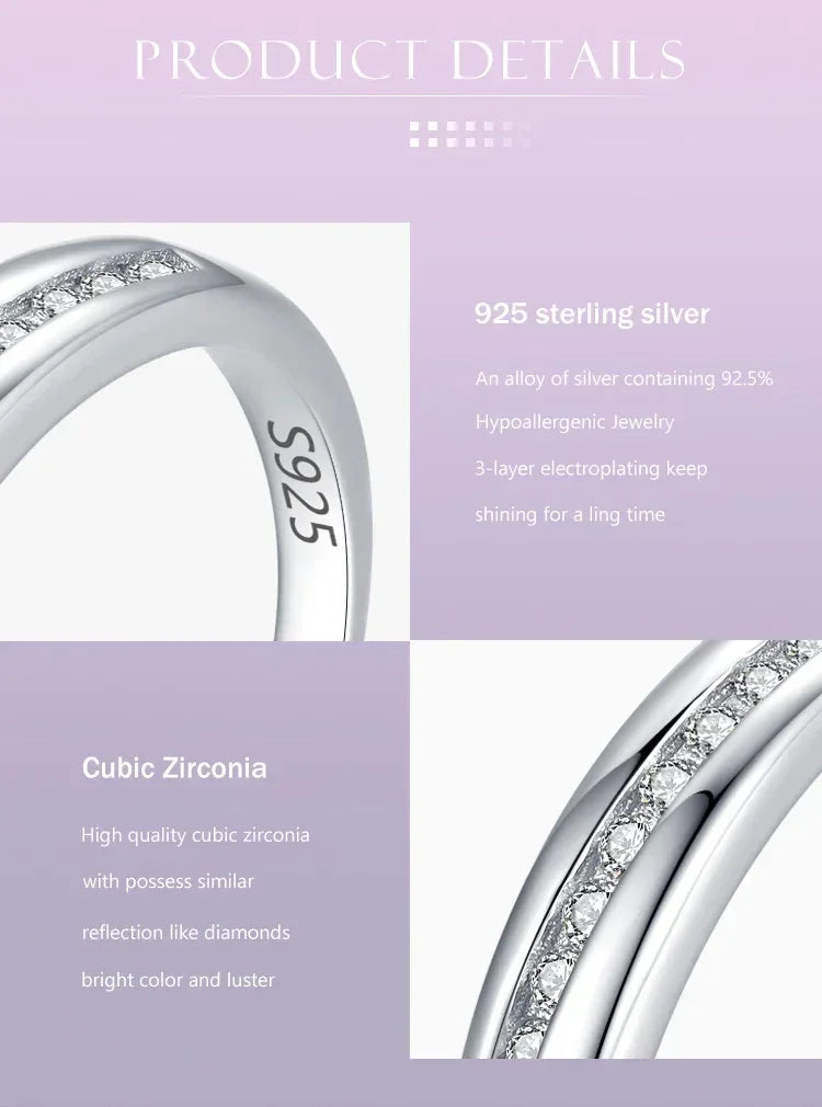 Close-up of a 925 sterling silver ring with cubic zirconia stones set in a row, shiny finish.