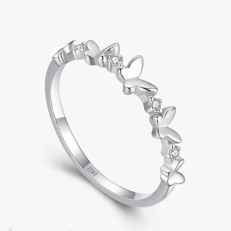 Sterling silver butterfly ring with small clear gemstones, elegant women's jewelry