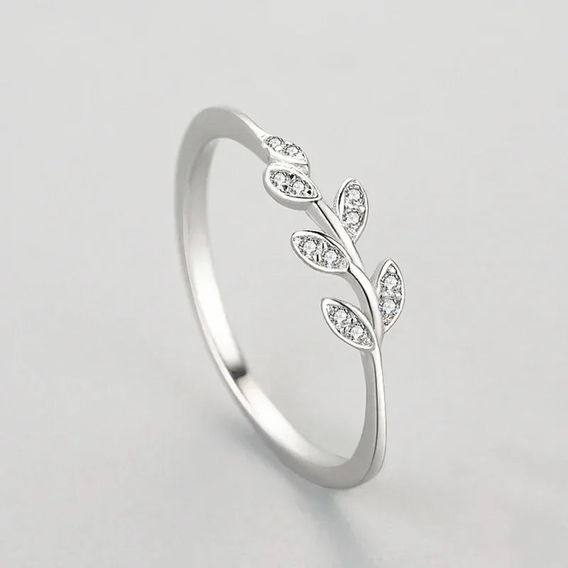 Sterling silver leaf ring with clear crystals, delicate botanical jewelry design