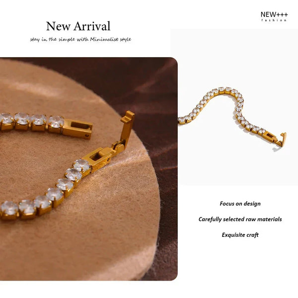 Gold bracelet with clear stones on a brown surface, labeled 'New Arrival' and 'NEW++ FASHION'.