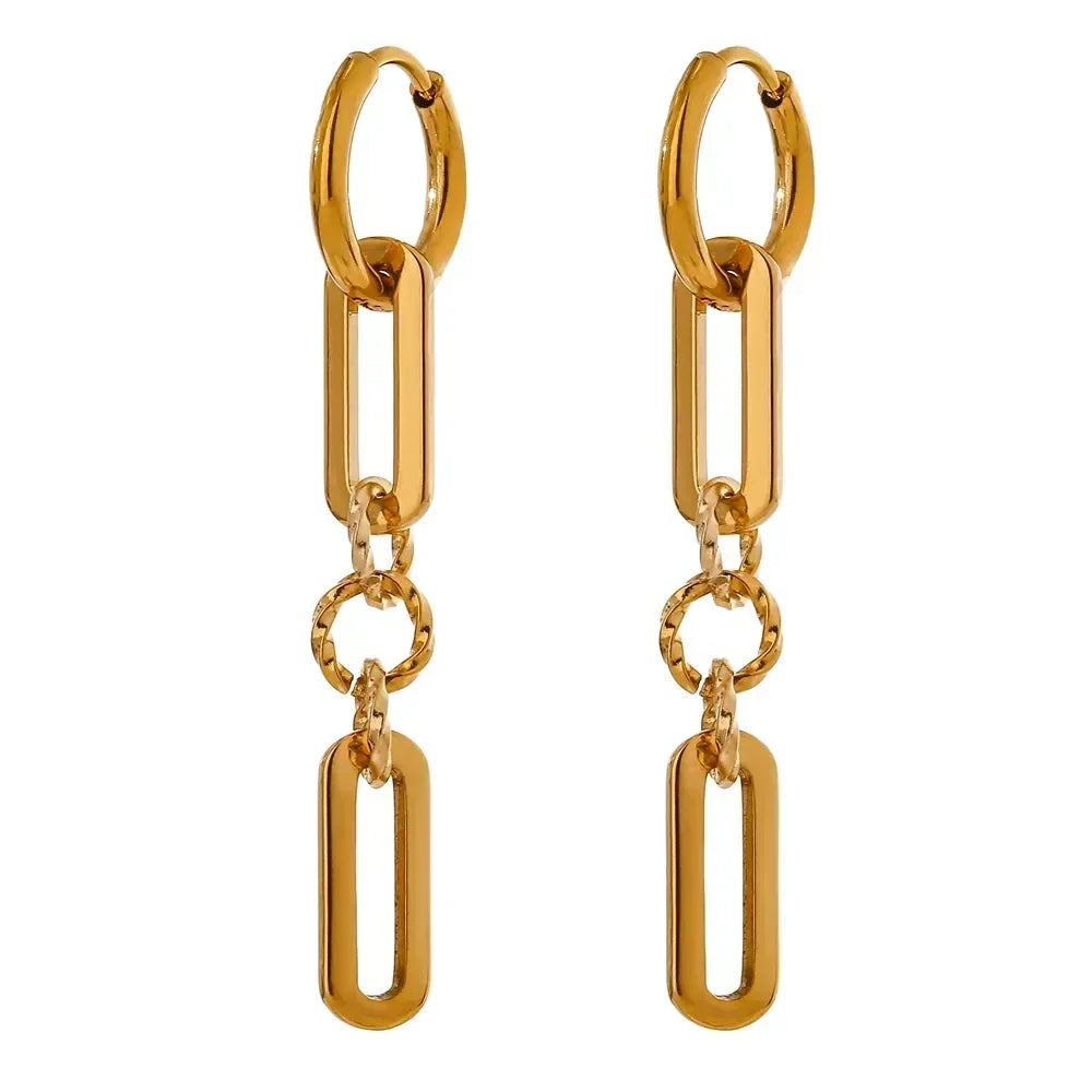 Pair of gold-plated dangle chain link earrings on white background