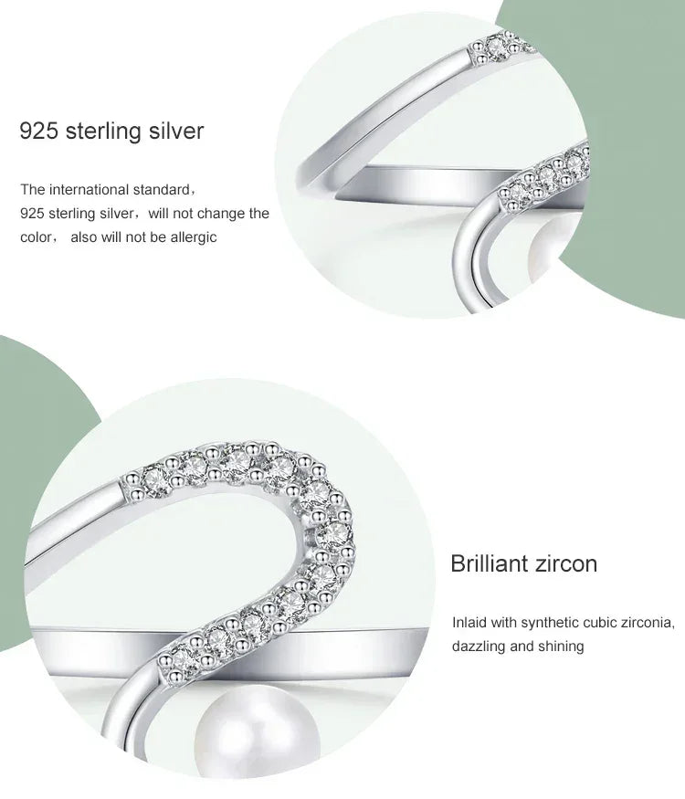 925 sterling silver ring with cubic zirconia and a pearl detail, elegant modern design